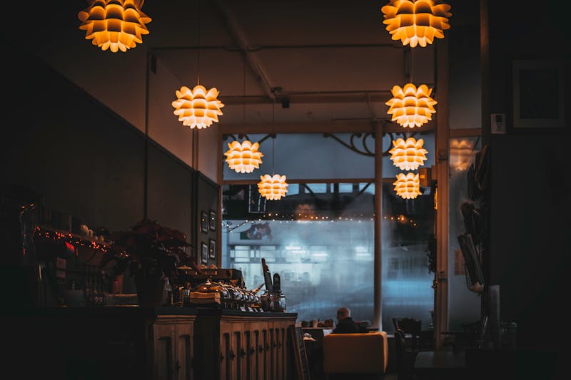 Cozy pizza restaurant interior with warm lighting